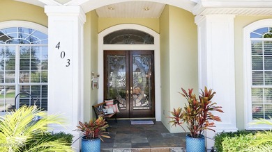 Welcome to waterfront living in the highly sought-after gated - photo 5