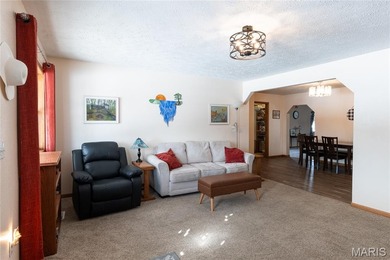 This well-maintained 4-bedroom, 2.5-bath home sits on a spacious