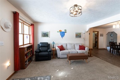 This well-maintained 4-bedroom, 2.5-bath home sits on a spacious