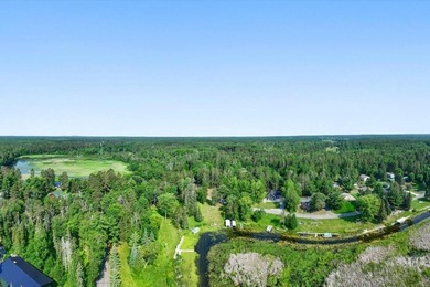 Nestled among mature pines and along a peaceful channel, the - photo 9