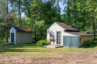Nestled among mature pines and along a peaceful channel, the - photo 10