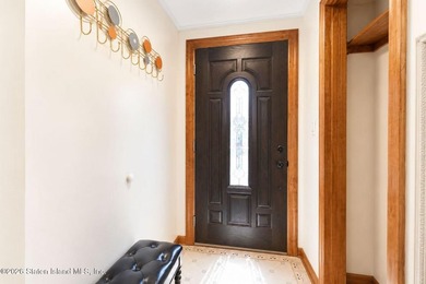 This is a beautifully renovated semi-attached brick - photo 5