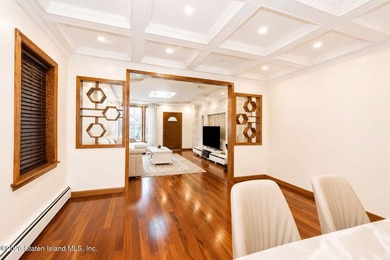 This is a beautifully renovated semi-attached brick - photo 9
