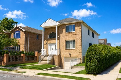 This gorgeous 2-family, 4-bedroom, 3-bathroom, side-hall - photo 2