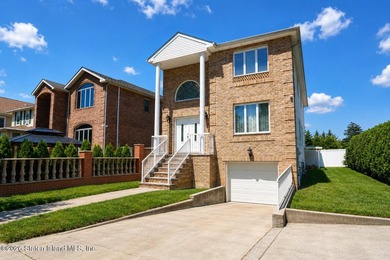 This gorgeous 2-family, 4-bedroom, 3-bathroom, side-hall - photo 3