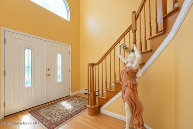 This gorgeous 2-family, 4-bedroom, 3-bathroom, side-hall - photo 5