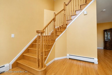 This gorgeous 2-family, 4-bedroom, 3-bathroom, side-hall - photo 6