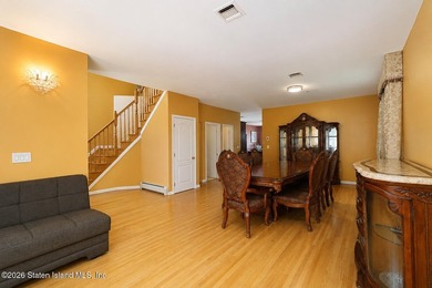 This gorgeous 2-family, 4-bedroom, 3-bathroom, side-hall - photo 8