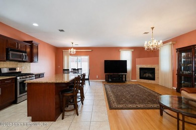 This gorgeous 2-family, 4-bedroom, 3-bathroom, side-hall - photo 9