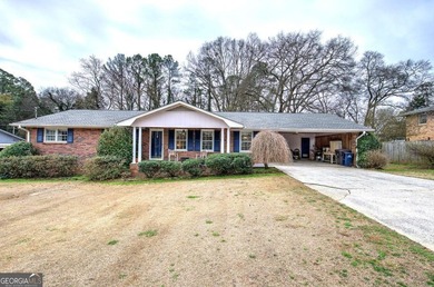 Charming 4-Sided Brick Ranch in the City with Original Hardwood
