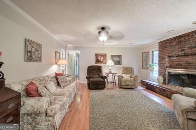 Charming 4-Sided Brick Ranch in the City with Original Hardwood