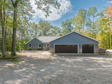Enjoy this 3 bdrm. 3.5 bath lakefront single story home with - Lake Home For Sale in Rhinelander, Wisconsin