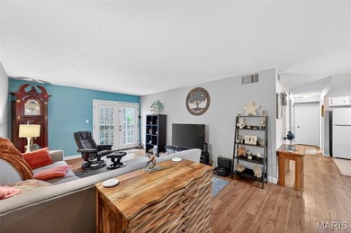 Welcome Home!  Spacious ground-level end-unit condo offering