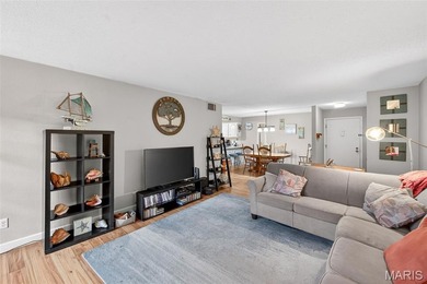 Welcome Home!  Spacious ground-level end-unit condo offering