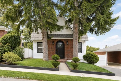 Welcome to 27 Hunton Street, a charming Tudor-style home nestled - photo 2