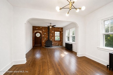 Welcome to 27 Hunton Street, a charming Tudor-style home nestled - photo 6