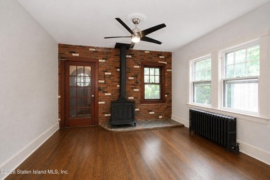 Welcome to 27 Hunton Street, a charming Tudor-style home nestled - photo 9