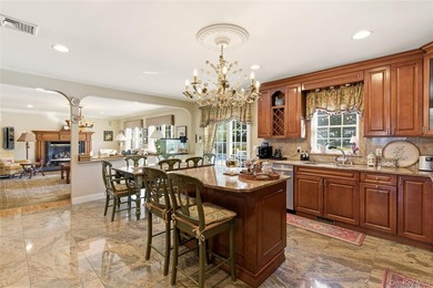 FLOWER HILL, ROSLYN | BRICK CENTER HALL COLONIAL. Located on a - photo 11