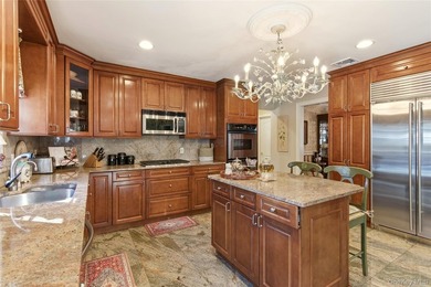 FLOWER HILL, ROSLYN | BRICK CENTER HALL COLONIAL. Located on a - photo 15