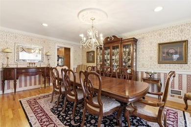 FLOWER HILL, ROSLYN | BRICK CENTER HALL COLONIAL. Located on a - photo 16