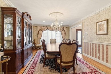 FLOWER HILL, ROSLYN | BRICK CENTER HALL COLONIAL. Located on a - photo 17