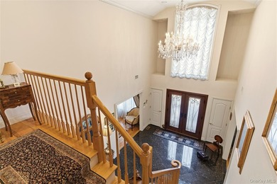FLOWER HILL, ROSLYN | BRICK CENTER HALL COLONIAL. Located on a - photo 20