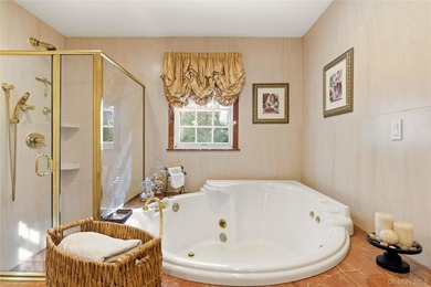 FLOWER HILL, ROSLYN | BRICK CENTER HALL COLONIAL. Located on a - photo 24