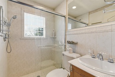 FLOWER HILL, ROSLYN | BRICK CENTER HALL COLONIAL. Located on a - photo 29