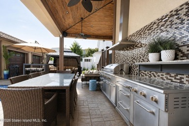Welcome to this exceptional detached two-family residence where - photo 9