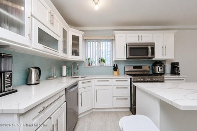 Welcome to 29 Natalie Court, an immaculate 4-bedroom, 3.5-bath - photo 3