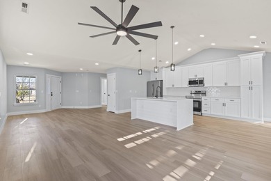 Welcome to this beautifully fully renovated 3 bedrooms, 2 and a - photo 6