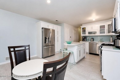 Welcome to 29 Natalie Court, an immaculate 4-bedroom, 3.5-bath - photo 6