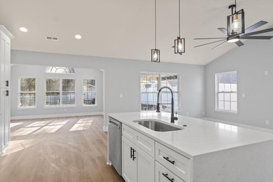 Welcome to this beautifully fully renovated 3 bedrooms, 2 and a - photo 9