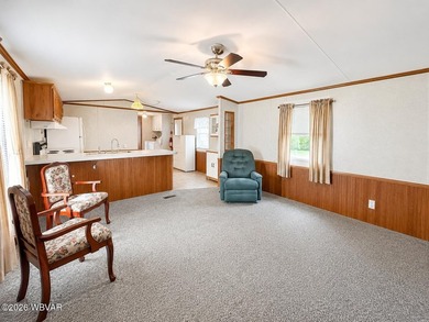 Affordable living in a well-maintained community! This 3-bedroom - photo 2