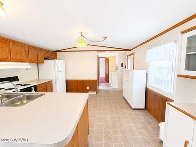 Affordable living in a well-maintained community! This 3-bedroom - photo 4