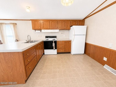 Affordable living in a well-maintained community! This 3-bedroom - photo 5
