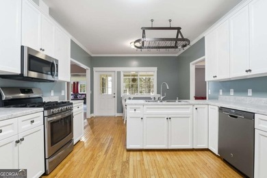 Fantastic Opportunity! This ranch home sits on just under half