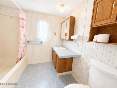 Affordable living in a well-maintained community! This 3-bedroom - photo 9