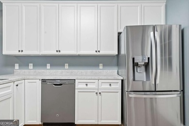 Fantastic Opportunity! This ranch home sits on just under half