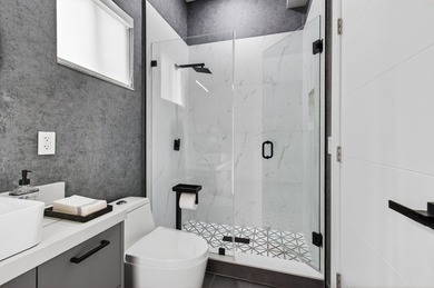 Don't miss this exceptional three-story townhome, masterfully - photo 27