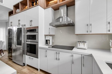 Don't miss this exceptional three-story townhome, masterfully - photo 30