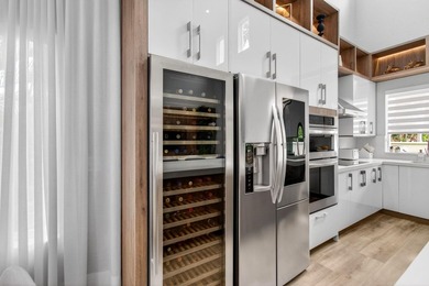 Don't miss this exceptional three-story townhome, masterfully - photo 33