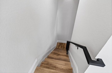 Don't miss this exceptional three-story townhome, masterfully - photo 48