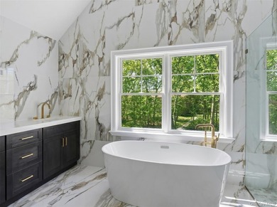 This stunning new construction estate, South of the Highway in - photo 14