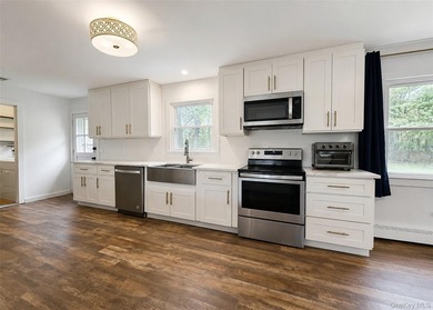 Come see this beautifully renovated Cape Cod-style home located - photo 4