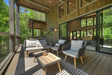 Tucked within the heart of the Aska Adventure Area, this fully - photo 33