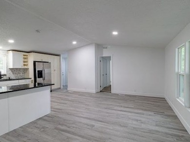 See this gorgeous multi-section home in a desirable park today! - photo 2