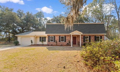 Nestled on almost an acre on a quiet street within the city - photo 1
