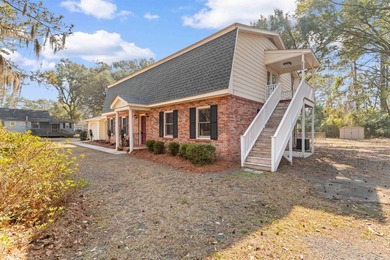 Nestled on almost an acre on a quiet street within the city - photo 2