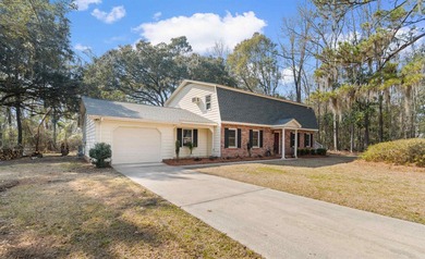 Nestled on almost an acre on a quiet street within the city - photo 3